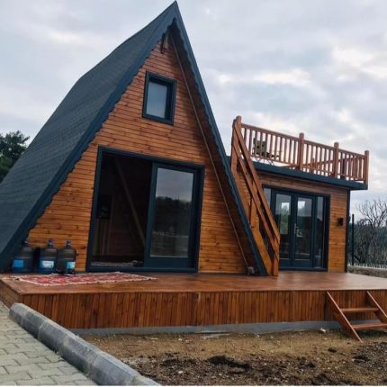Rumah Segitiga Kayu Jati Minimalis Rooftop